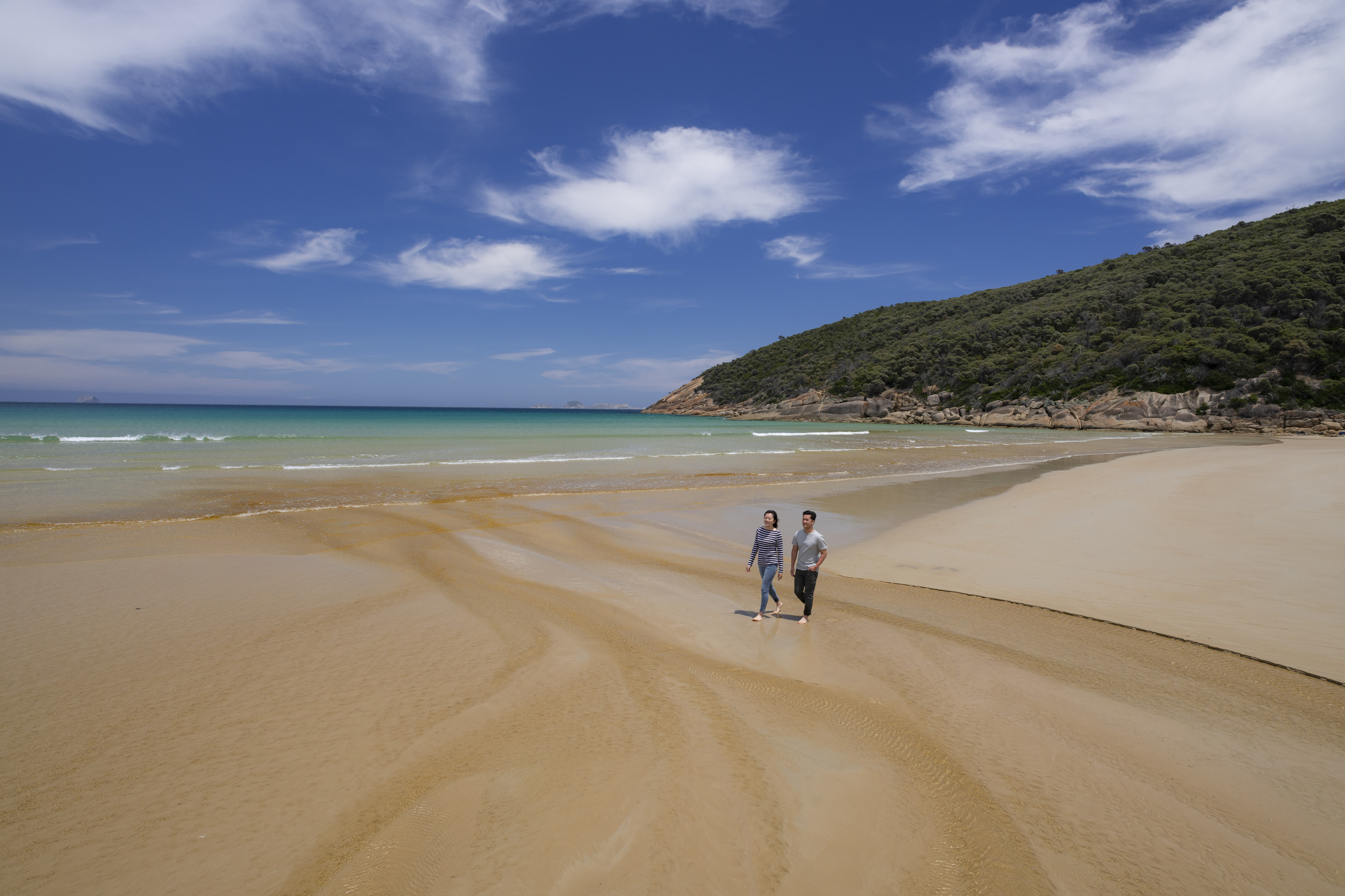 Norman Beach is the ideal spot for families to combine a scenic woodland walk with beachcombing and shallow river play.